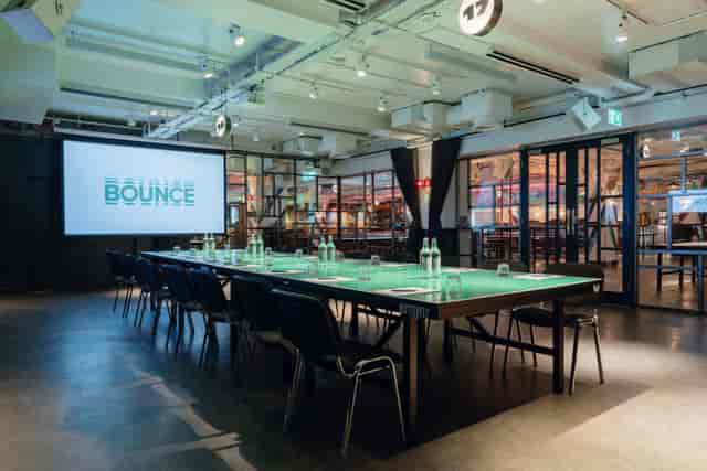 Ping-pong table boardroom at The Playroom Bounce Old Street for creative corporate team events.