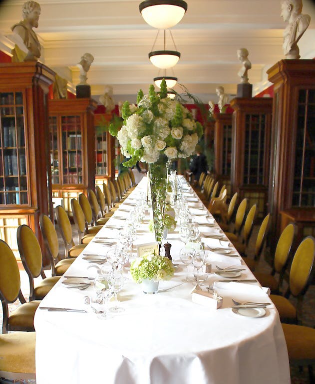 Elegant dining table with floral centerpiece at London Marriott Hotel for formal events.