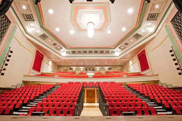 Great Hall Theatre with tiered seating, ideal for conferences and performances.