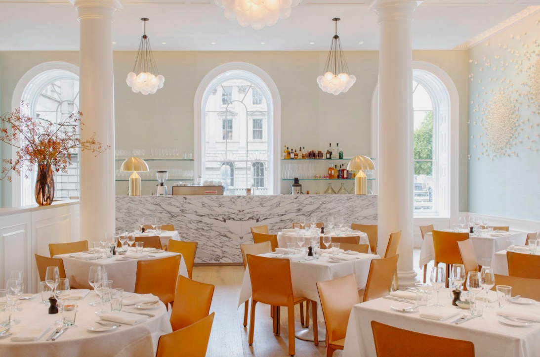 Elegant dining venue with marble accents, perfect for upscale events and receptions.