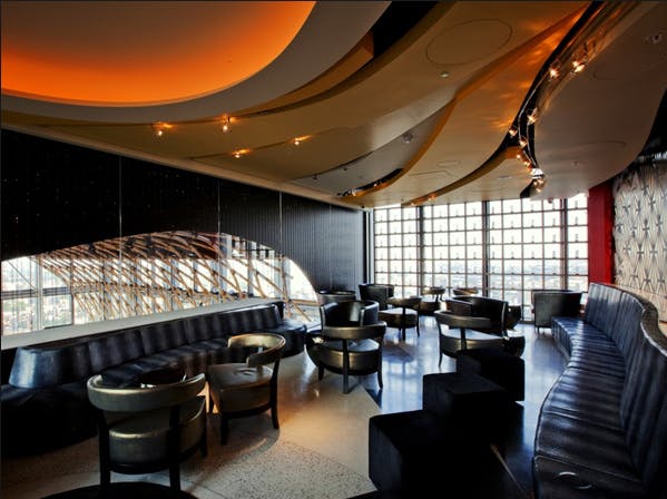 SUSHISAMBA Lounge: modern event space with elegant seating for upscale gatherings.