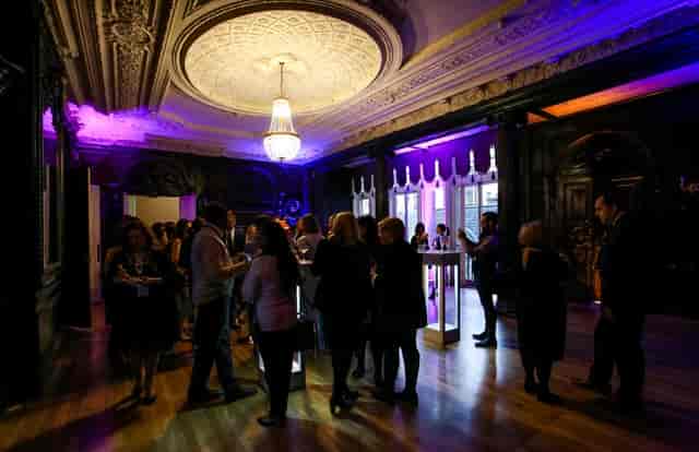 Churchill Room at Dartmouth House, elegant purple lighting for corporate events.