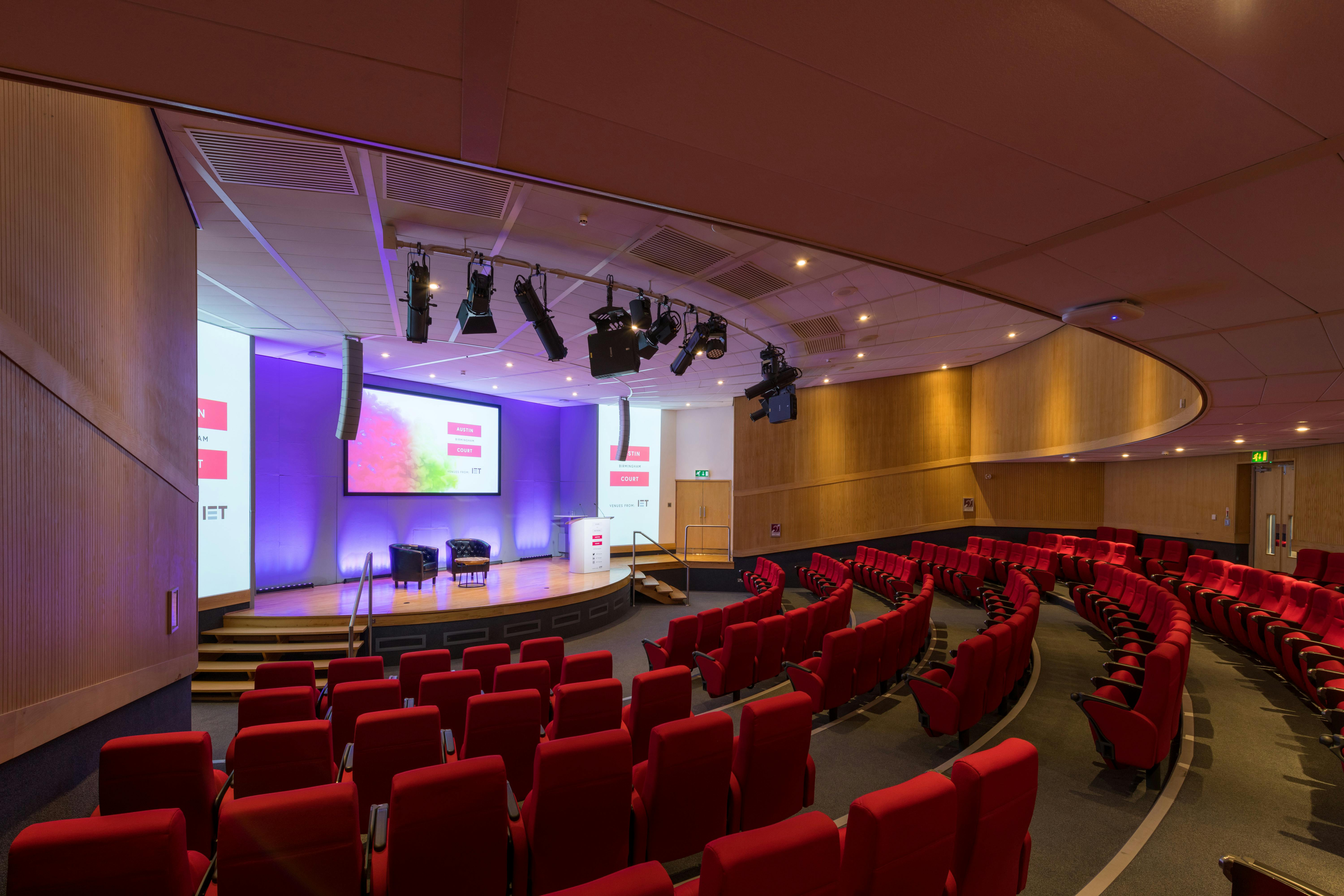 Kingston Theatre auditorium with tiered seating for conferences and presentations.