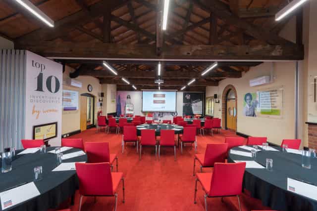 Lodge Room 2 at IET Birmingham: modern meeting space with circular seating for workshops.