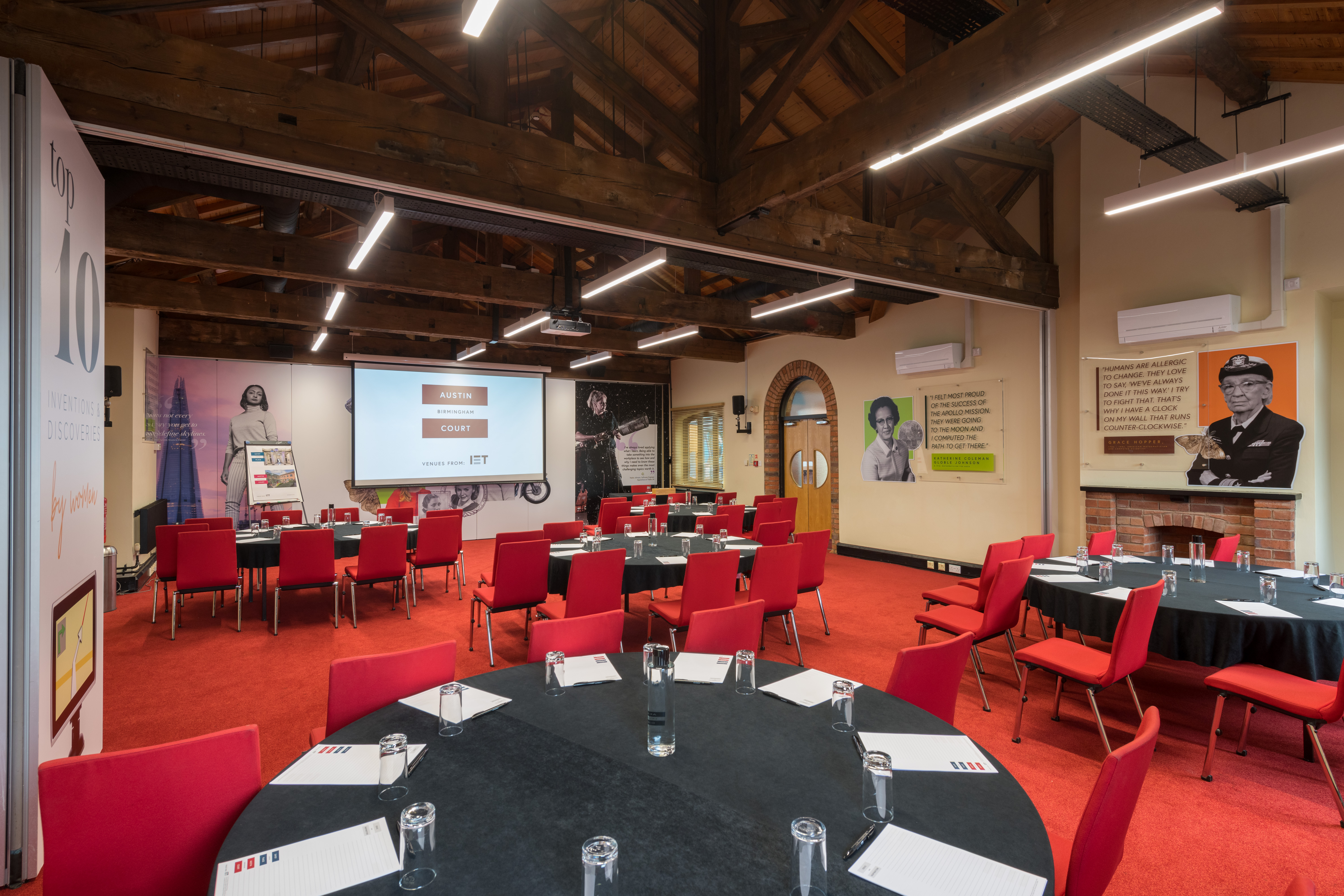 Lodge Room 2 at IET Birmingham: Austin Court, featuring round tables for conferences.