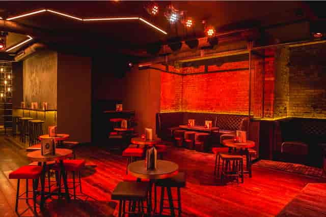 Stylish event space at The Basement with warm lighting, ideal for networking functions