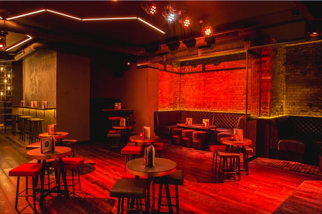 Stylish event space at The Basement with warm lighting, ideal for networking functions
