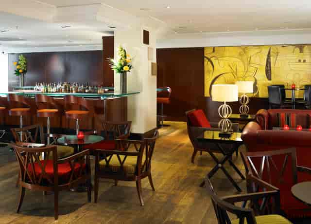Stylish lounge in London Marriott Kensington, perfect for networking events and meetings.