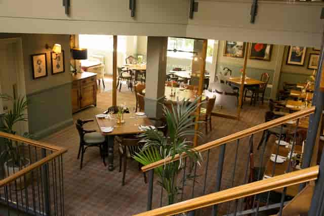 Main Cow Shed venue at The Bickley Pub, featuring a cozy, multi-level layout for networking events.