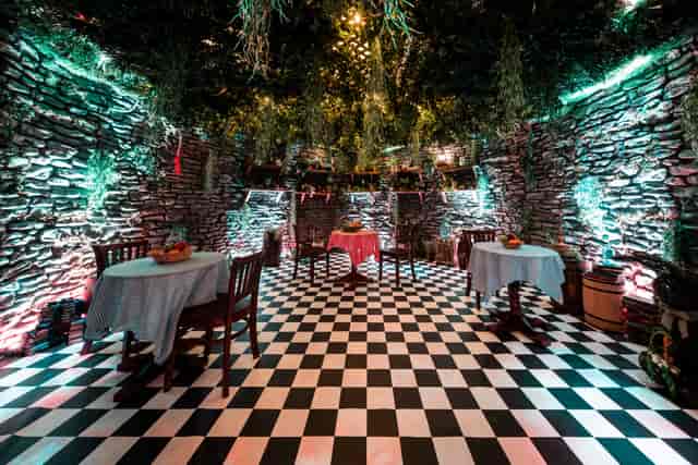 Cambridge QEII Centre: rustic event space with stone walls, ideal for cocktail receptions.
