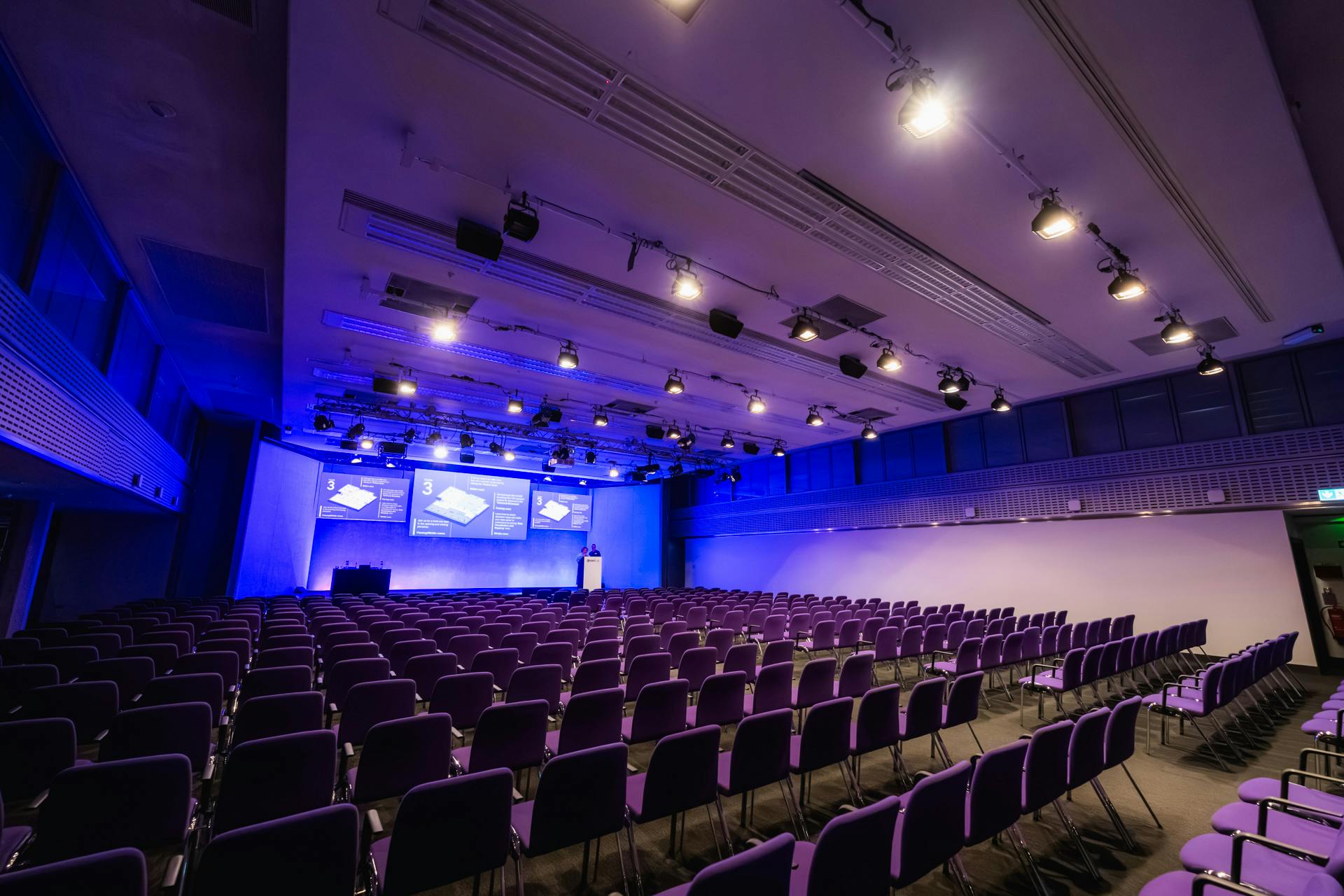 Mountbatten conference room with purple chairs, ideal for professional events and presentations.