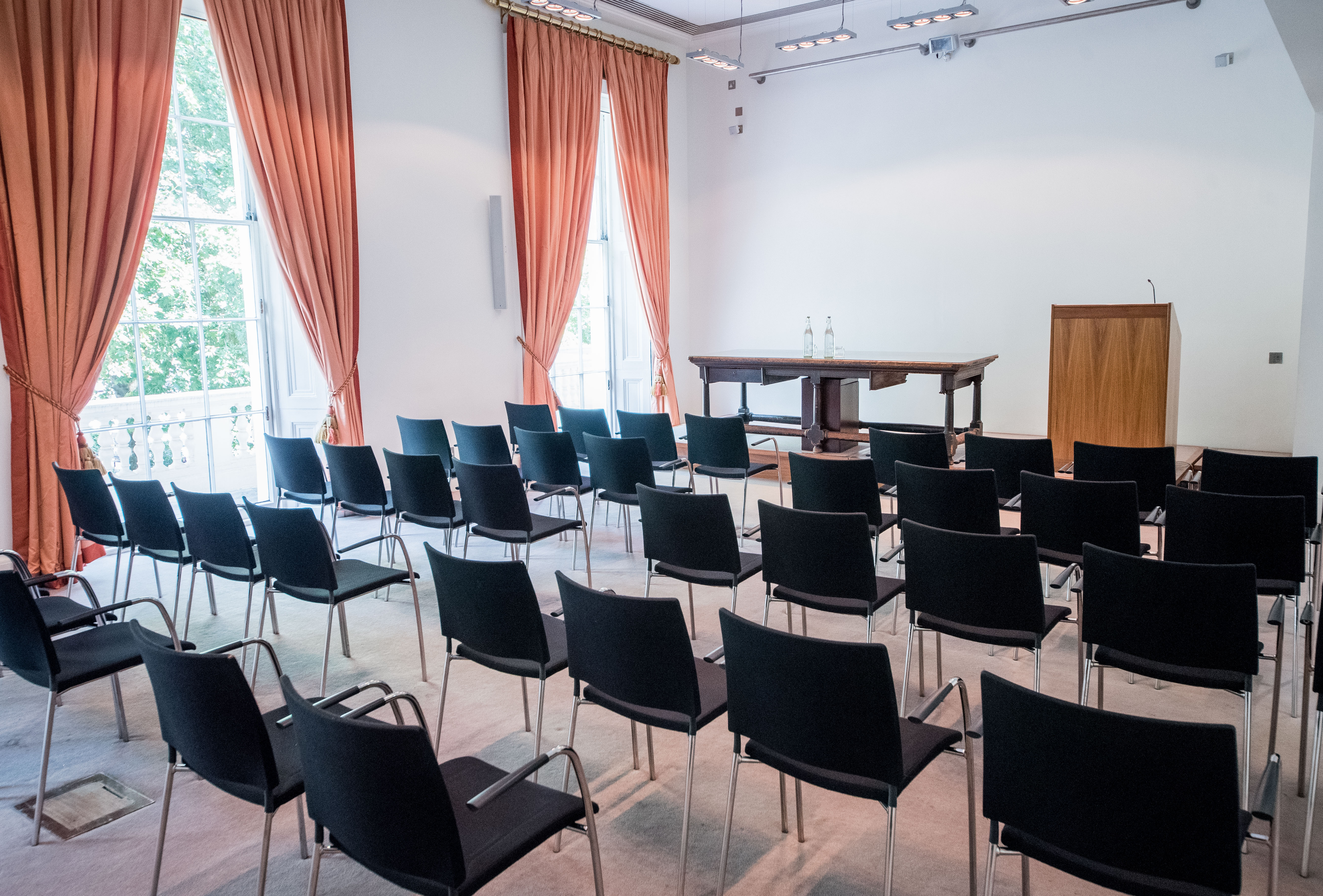 Conference Room at The Royal Society with black chairs, ideal for presentations and workshops. - Banner