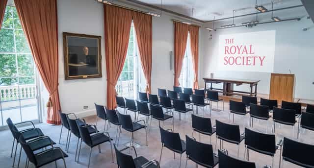 Conference Room at The Royal Society with black chairs for academic events and presentations.