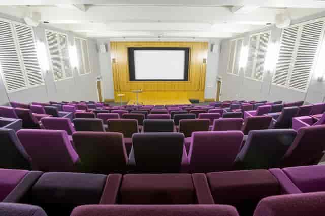 Henry Wellcome Auditorium with tiered seating, ideal for conferences and lectures.