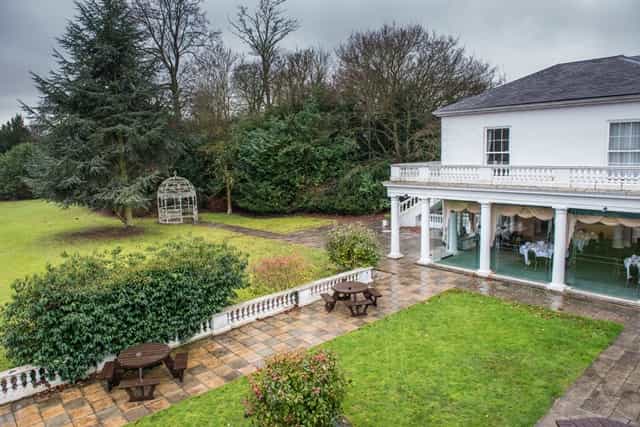 Library Room at Manor of Groves: elegant outdoor venue for meetings and events.