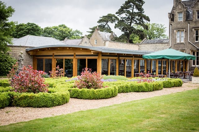 Syndicate Rooms outdoor terrace at Shendish Manor, ideal for events and receptions.