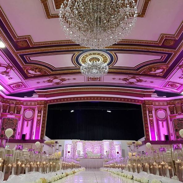 Grand Ballroom at The Royal Regency with elegant chandeliers, perfect for events and celebrations. - Banner