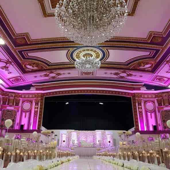 Grand Ballroom at The Royal Regency with elegant chandeliers, perfect for events and celebrations.