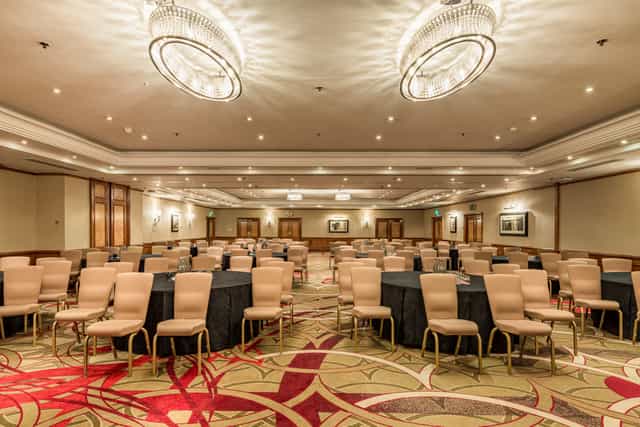 Hyde Park meeting room with round tables, ideal for conferences and workshops.