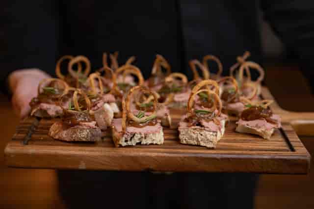 Gourmet hors d'oeuvres platter at The Vault Bar, ideal for networking events.