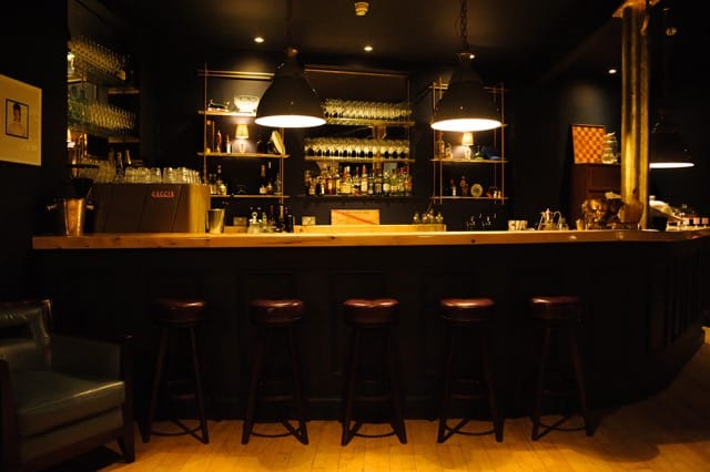 Stylish bar at fivefourstudios, perfect for networking events and cocktail receptions.