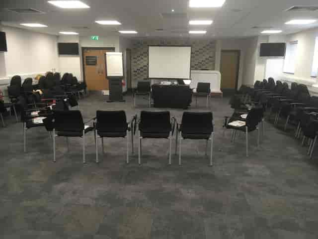 Media Suite at Molineux Stadium, circular seating for workshops and meetings.