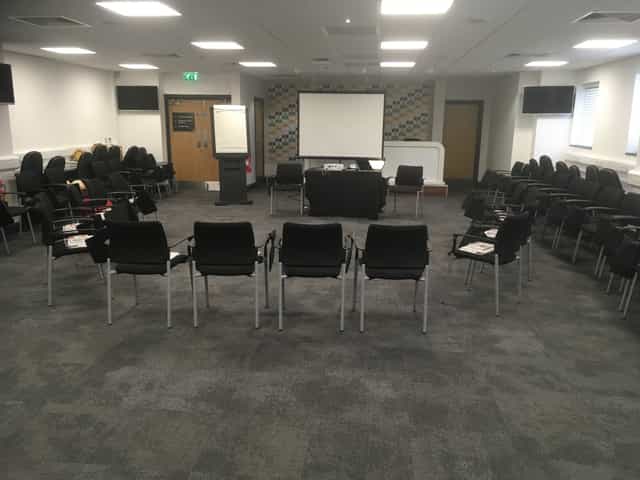 Media Suite at Molineux Stadium, circular seating for workshops and meetings.
