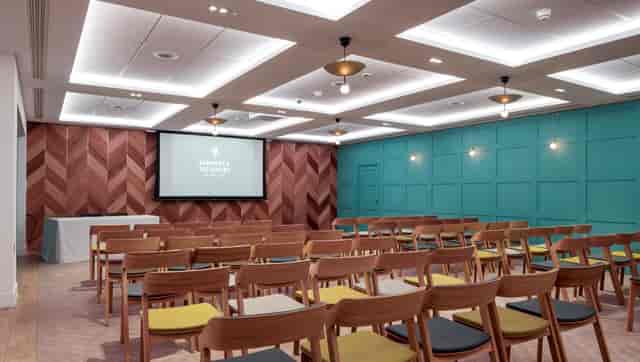 Great Hall meeting space with modern design, ideal for presentations and events.