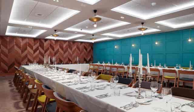 Elegant dining setup in The Great Hall, perfect for formal dinners and corporate events.