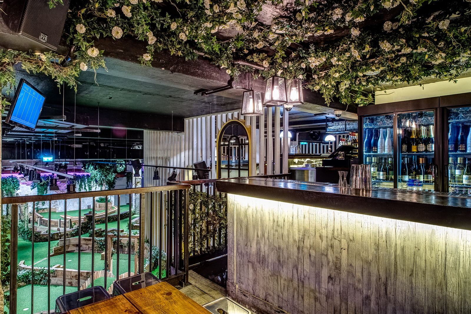 Upperclub House & Gin Terrace: stylish venue with floral decor for events and gatherings. - Banner