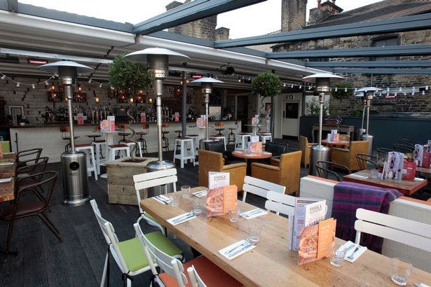 Rooftop Terrace at Revolution Huddersfield, modern venue for networking events and gatherings.