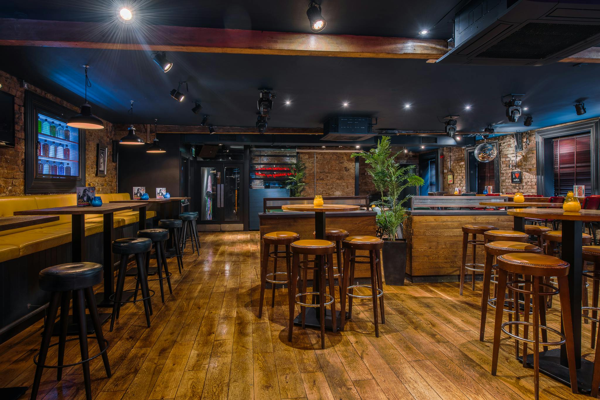 Versatile event space with wooden flooring in The Loft, Revolution Oxford Road, Manchester.