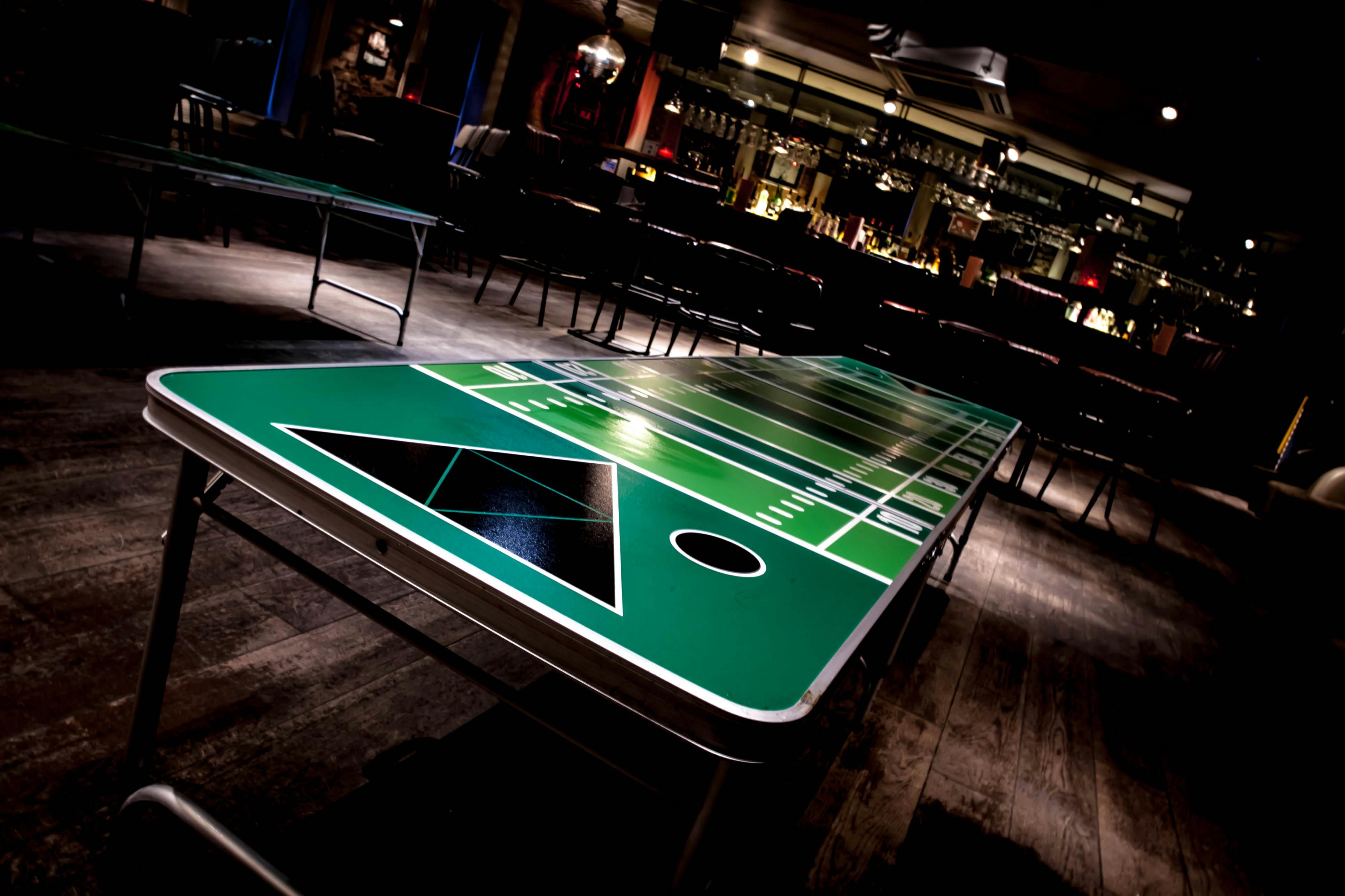 Vibrant football-themed table setup for a sports event at The Loft, Revolution Oxford Road.