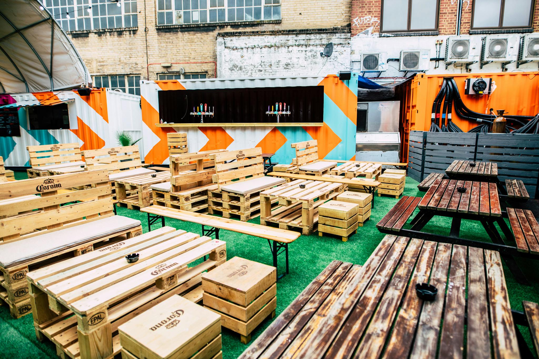 Vauxhall Street Food Garden with rustic wooden furniture for casual outdoor events.