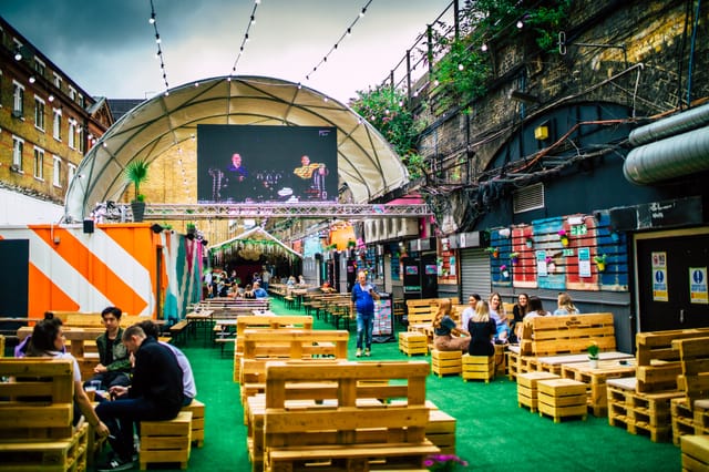 Vauxhall Street Food Garden with vibrant seating and greenery for casual events.
