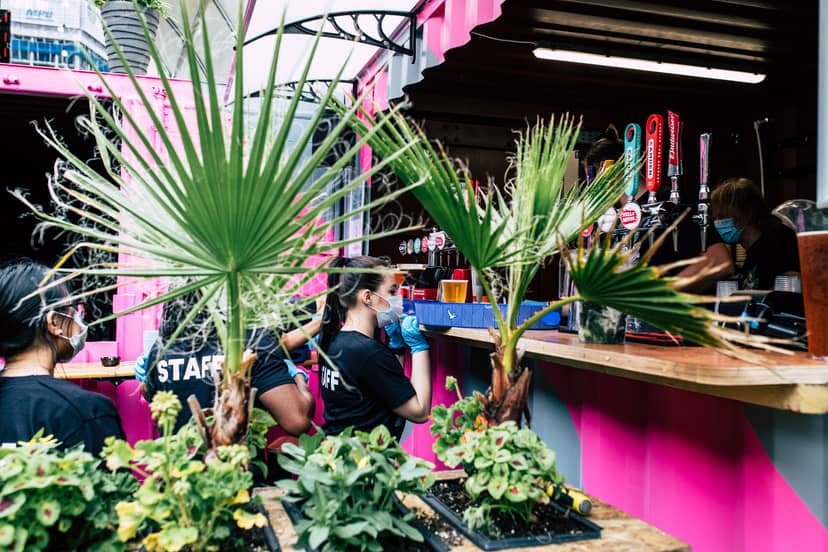Vibrant Vauxhall Street Food Garden with colorful bar, ideal for casual events and craft beverages.