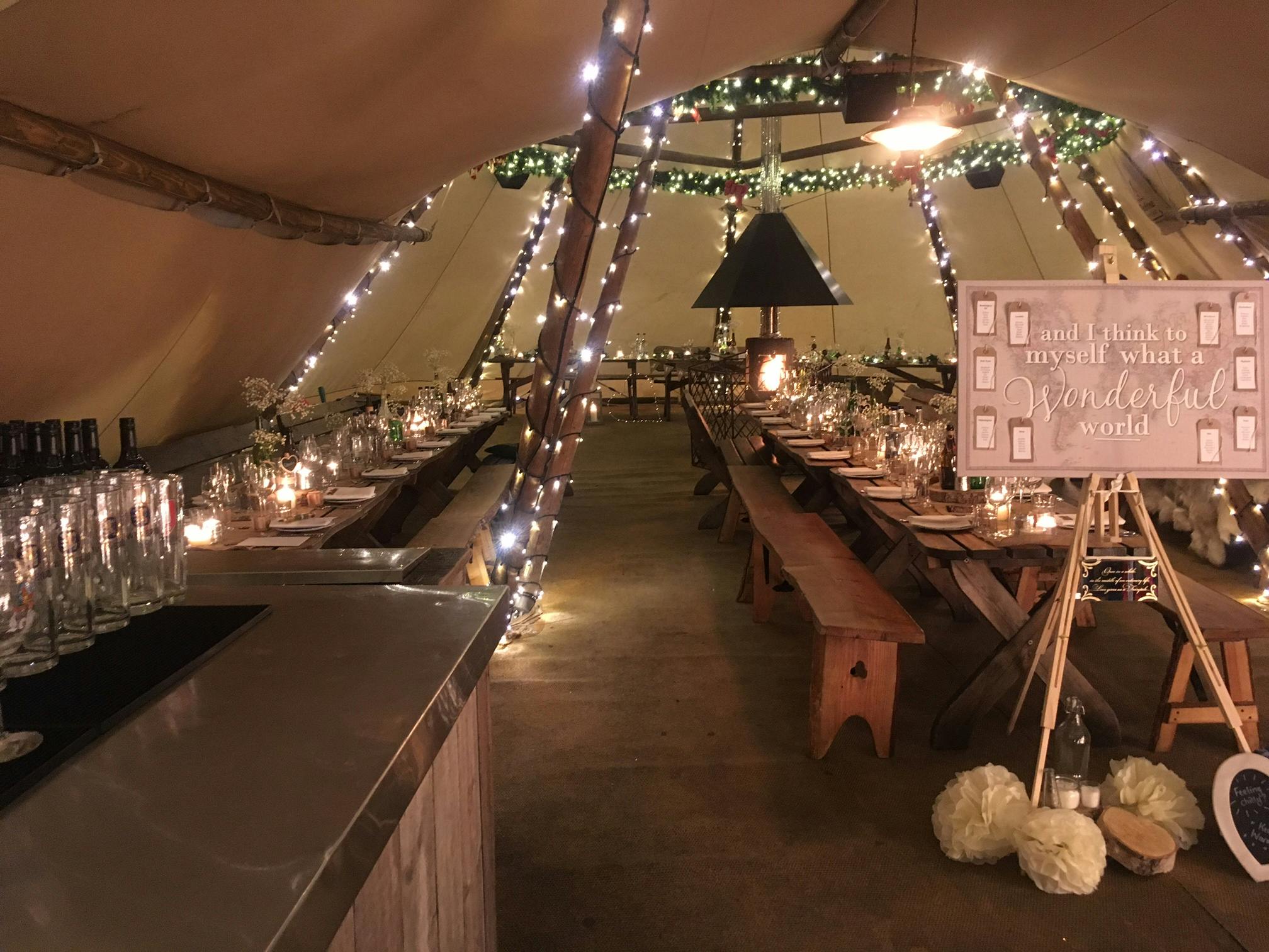 Curious TeePee event space with rustic decor, ideal for intimate dinners and celebrations.