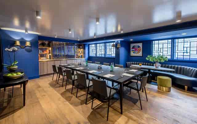Modern meeting space in The Blue Room, ideal for executive meetings and small events.