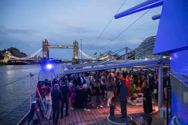 Jubilee Deck, HMS Belfast: Evening networking reception with Tower Bridge backdrop for events.