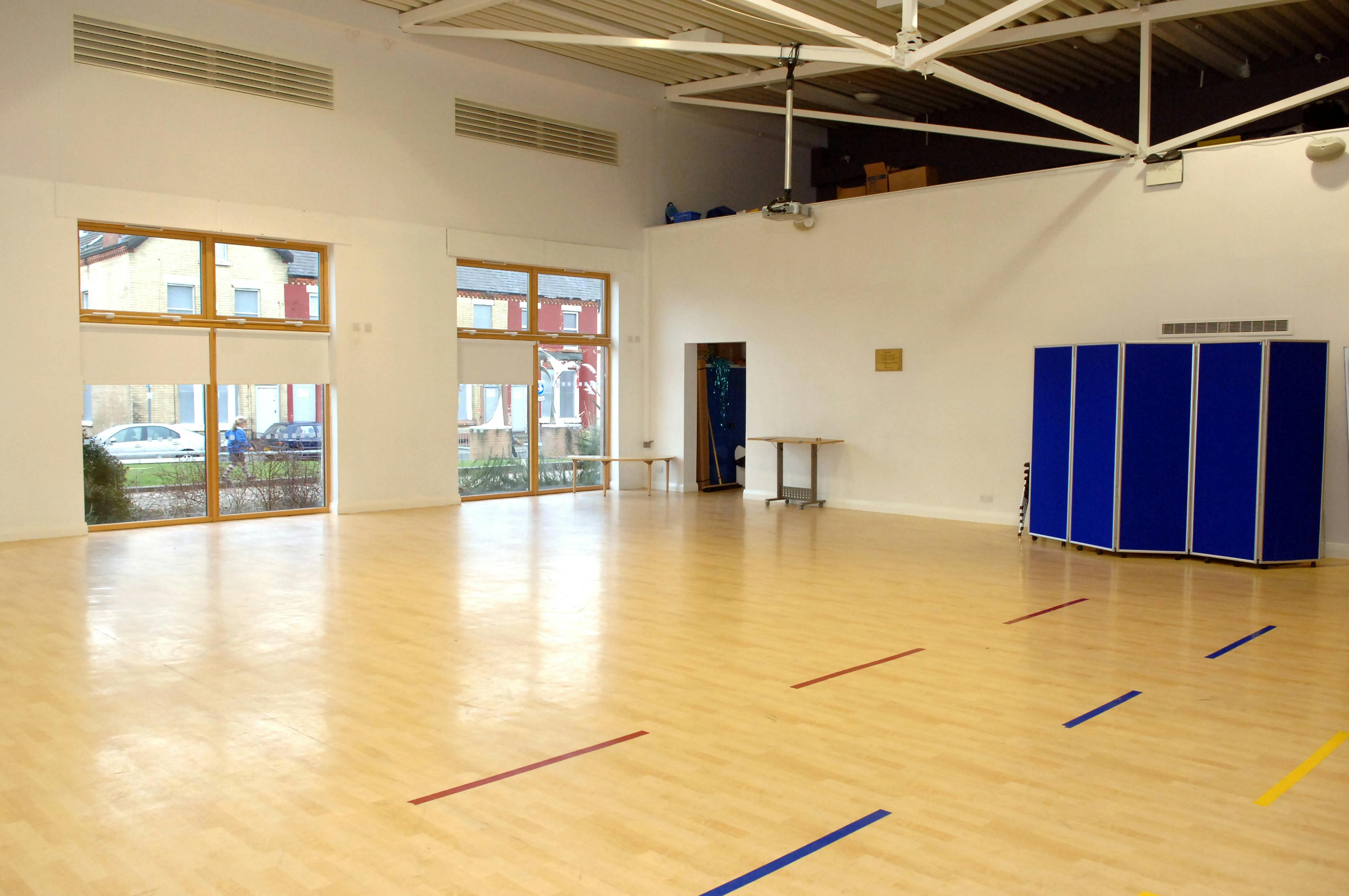 Spacious event space in Life Bank with wooden flooring for workshops and meetings.