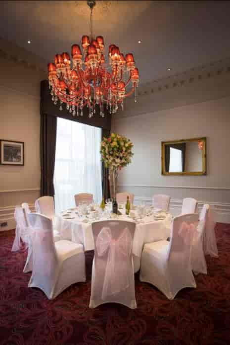 Elegant round table in The Viceroy Room, ideal for weddings and upscale events.
