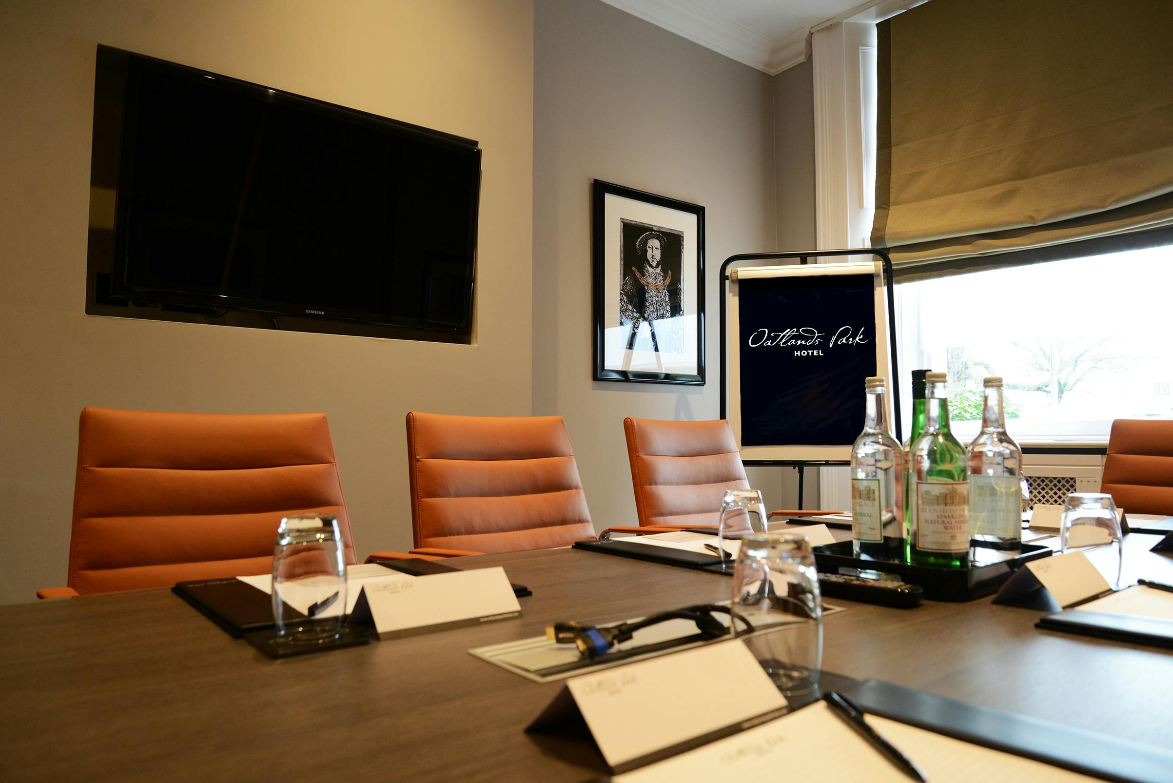 Howard Room at Oatlands Park Hotel, modern meeting space with sleek table for professional events.