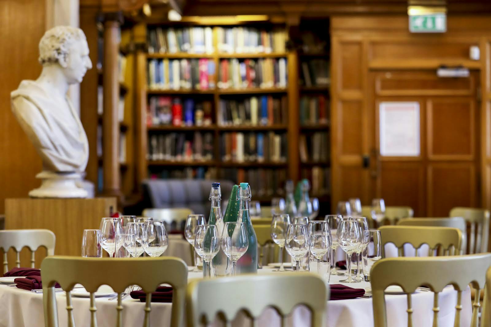 Elegant dining setup in Library at One Birdcage Walk for corporate events and gatherings.