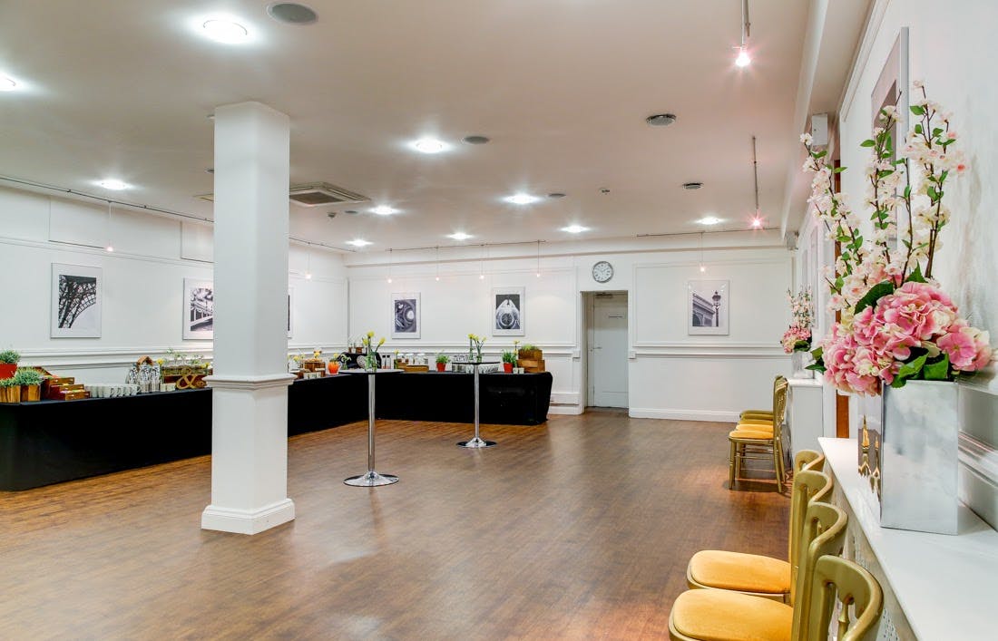 Marble Hall event space with elegant decor, ideal for meetings and gatherings.