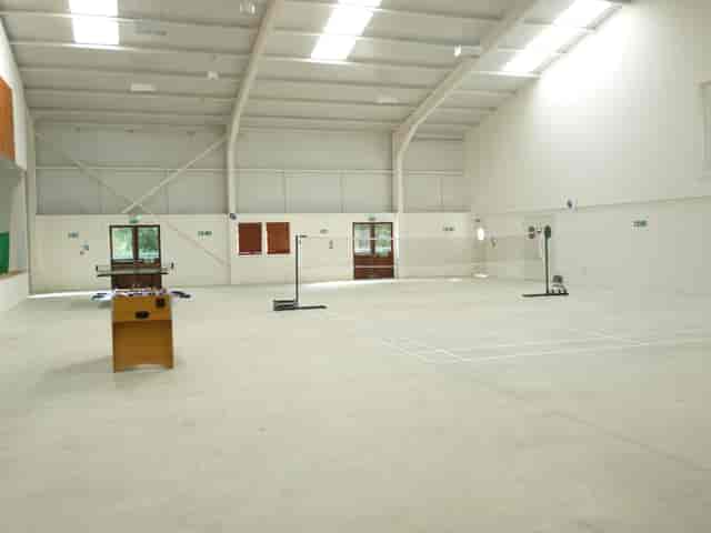 Spacious Sports Hall in Deanwood Barn, ideal for workshops and events with natural light.
