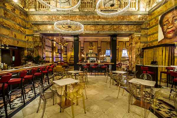 Elegant restaurant area with marble finishes, perfect for upscale events and receptions.