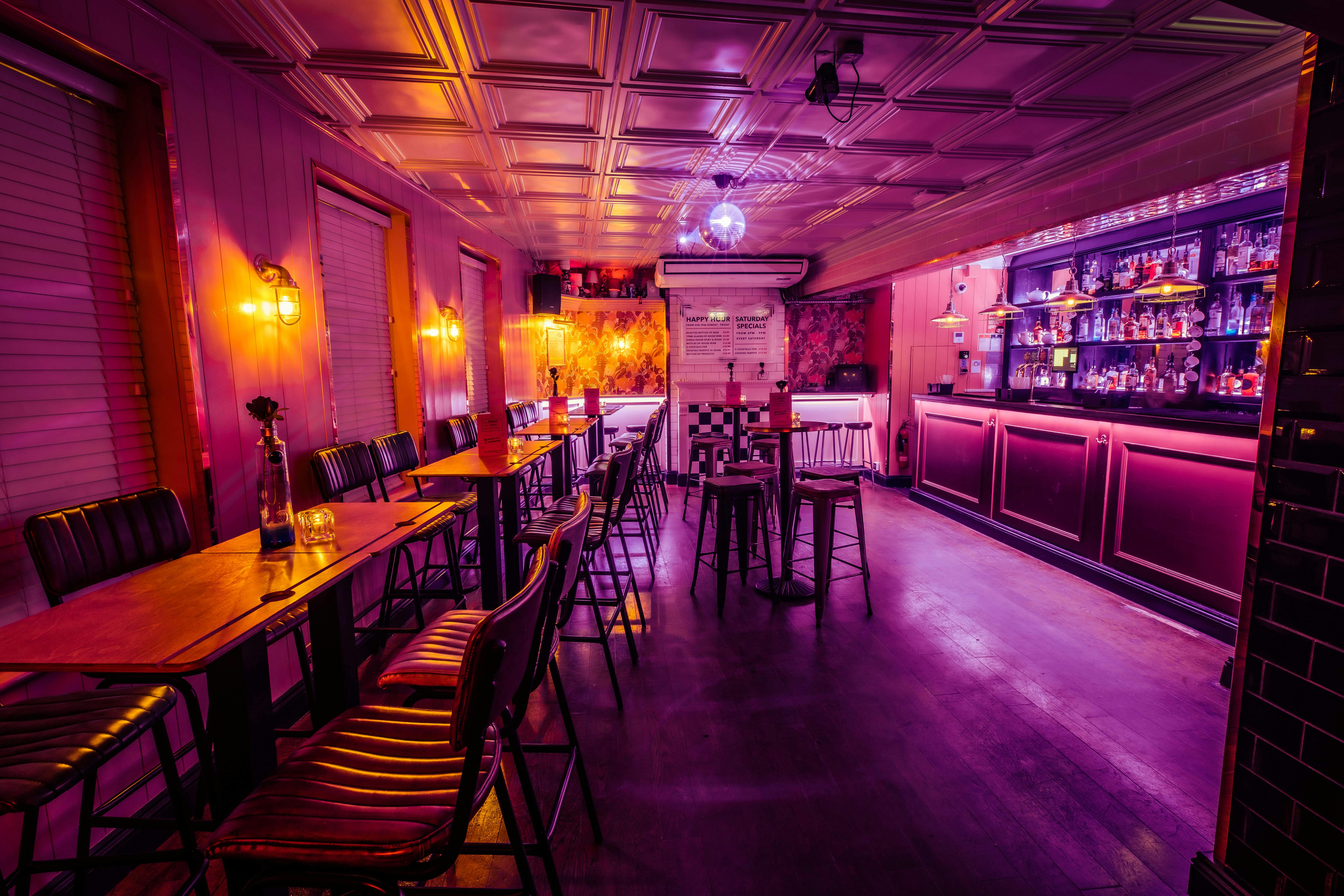 Vibrant Function Room with stylish bar, ideal for cocktail receptions and private parties.