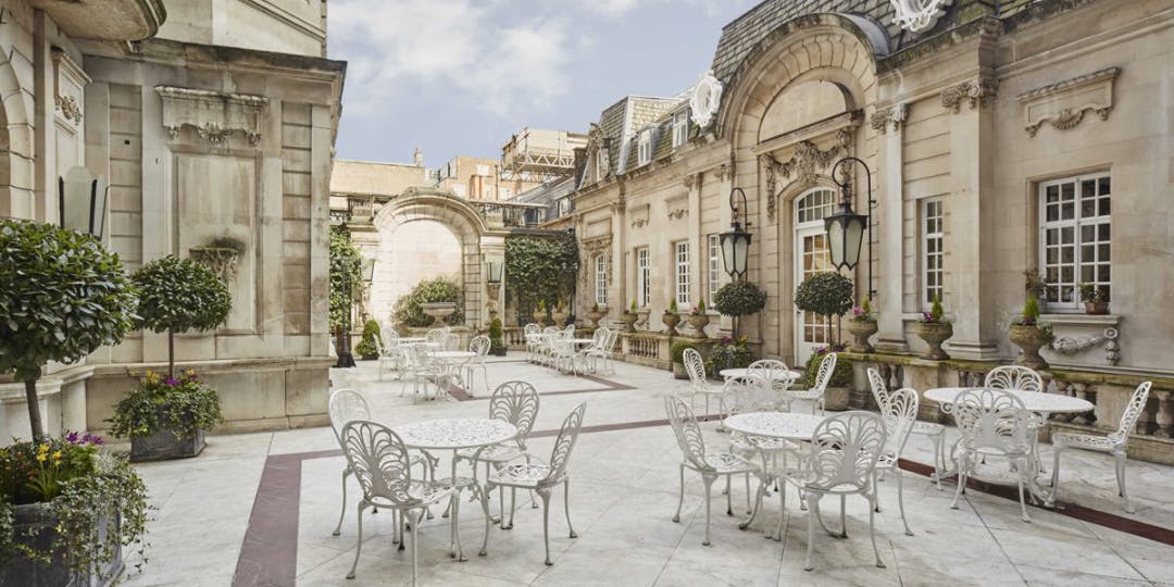 Charming outdoor venue at Dartmouth House with lush greenery for elegant events.