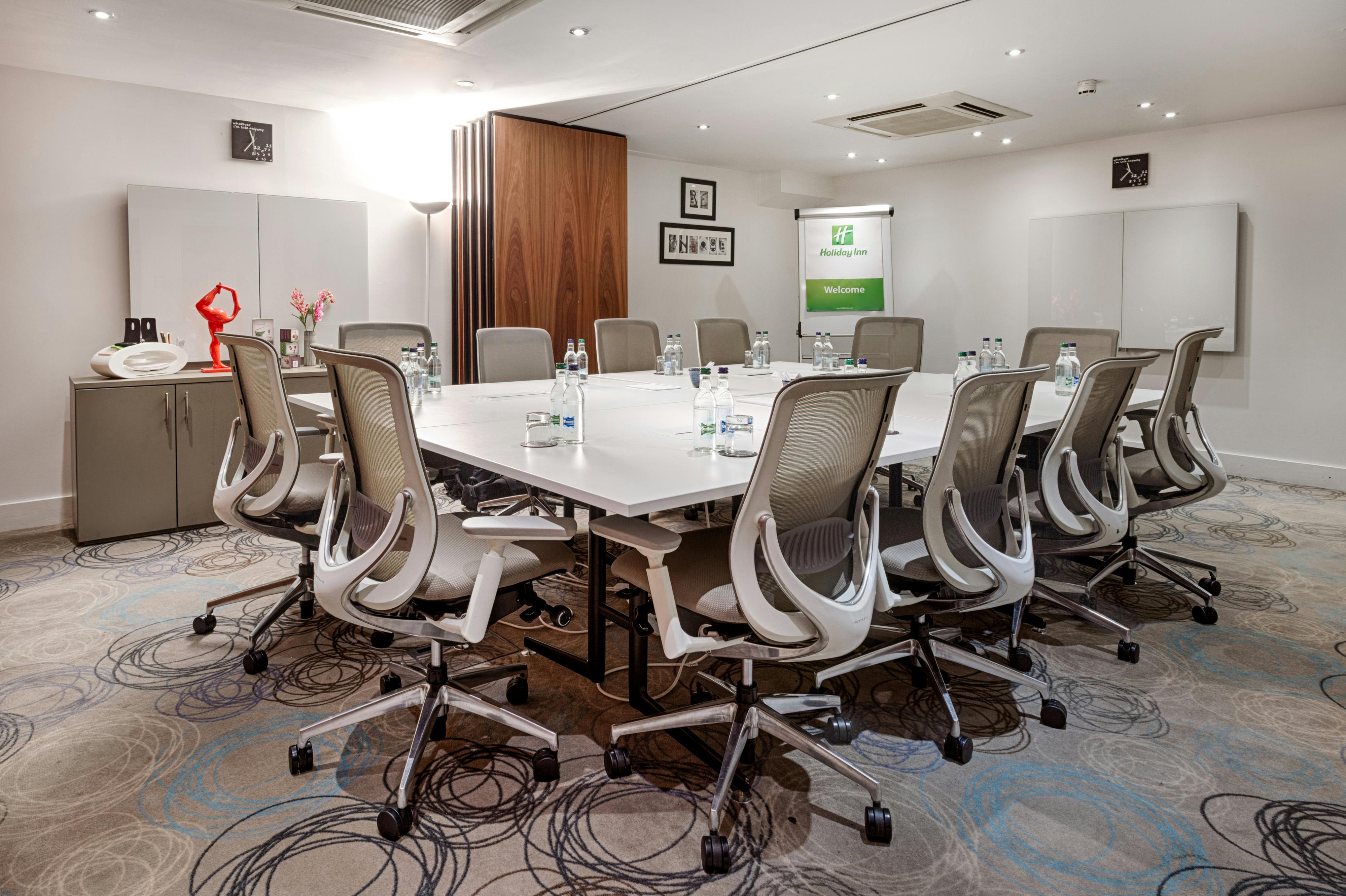 Mezzanine Suite at Holiday Inn Camden Lock, modern meeting room for workshops and strategy sessions.