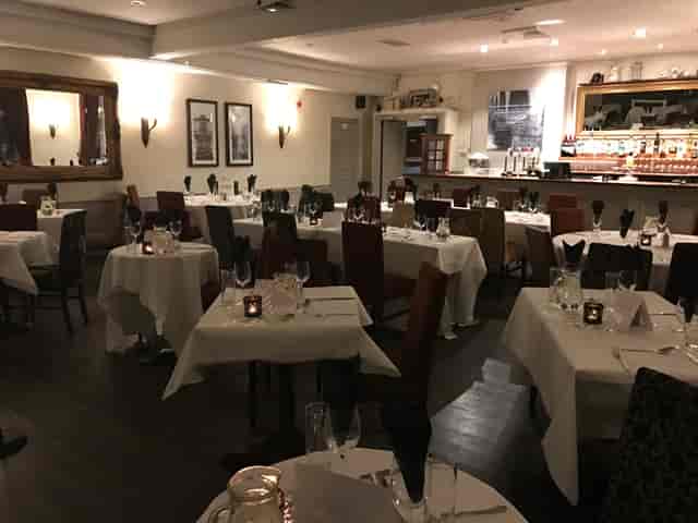Windsor Room at The Crown Hotel with formal table settings for private dining and social events.